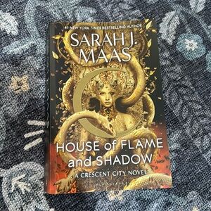 Crescent City House of flame and shadow by Sarah J Mass.